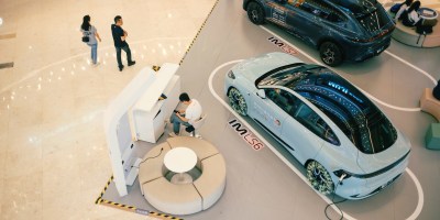 Photo of an EV selling stand in a Chinese Mall
